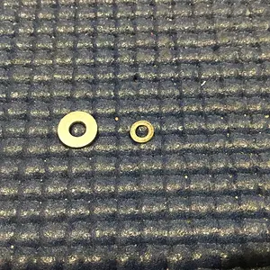 Replacing shock piston washer