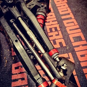 Full titanium front end, drive shaft pillow balls and turnbuckles